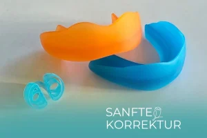 Zwei Dentosophie-Balancer und ein funktionelles Element zur Förderung der Nasenatmung für die ganzheitliche Zahnkorrektur.
